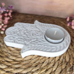 Fatima keze mécsestartó